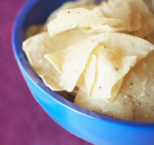 White corn chips are easier to chew than the yellow variety.